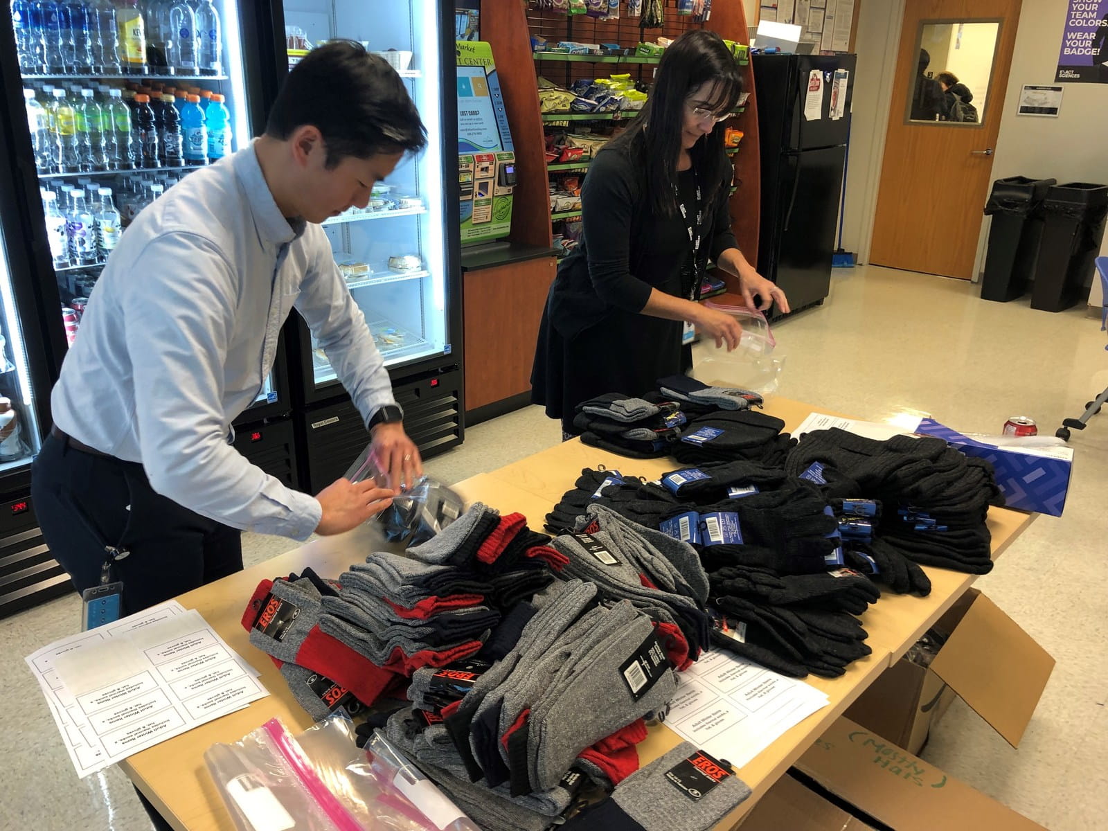 Packing socks at the Give Back Roadshow 2019